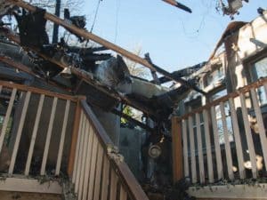 Post fire house image missing roof and most of the second floor